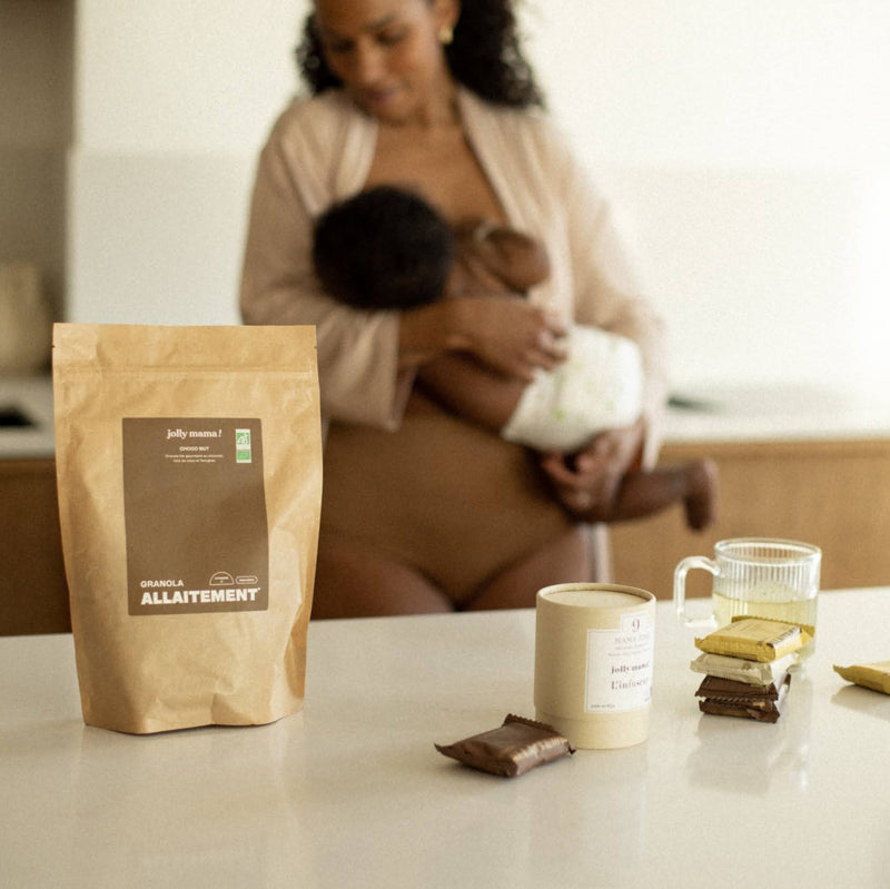 Breastfeeding mother with Jolly Mama Choco Nut granola and snacks to naturally support breastfeeding